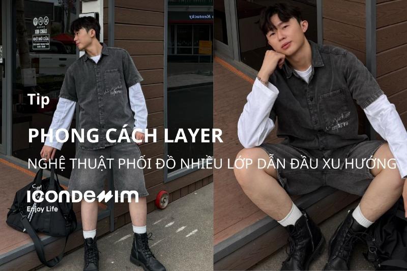 Cách mặc áo sơ mi nam đẹp với phong cách layering, kết hợp sơ mi denim khoác ngoài áo thun trắng, tạo vẻ ngoài năng động và thời trang